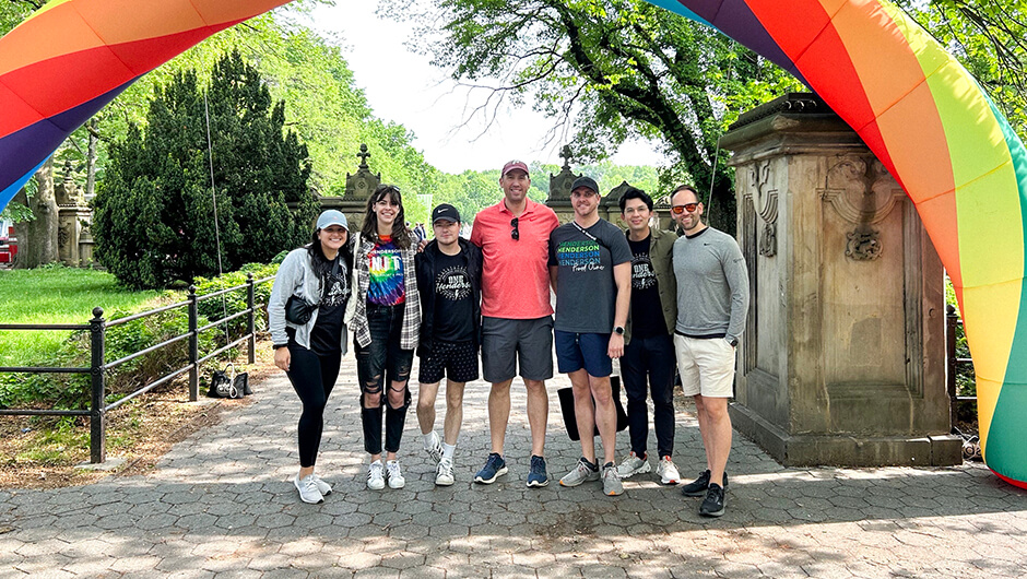 Group of six Henderson Engineers employees from the New York office at a pride event.