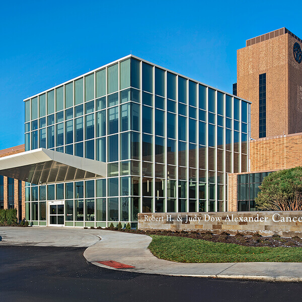 The exterior of a cancer center at a modern hospital.