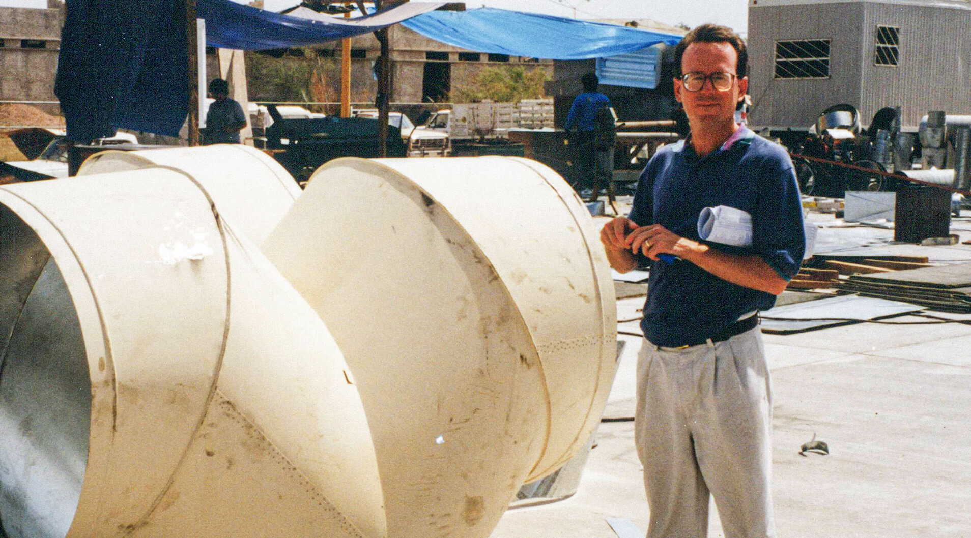 Duane Henderson, on-site, surveying the job site.